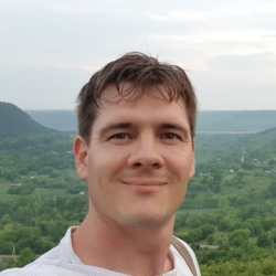 Александр Каминский